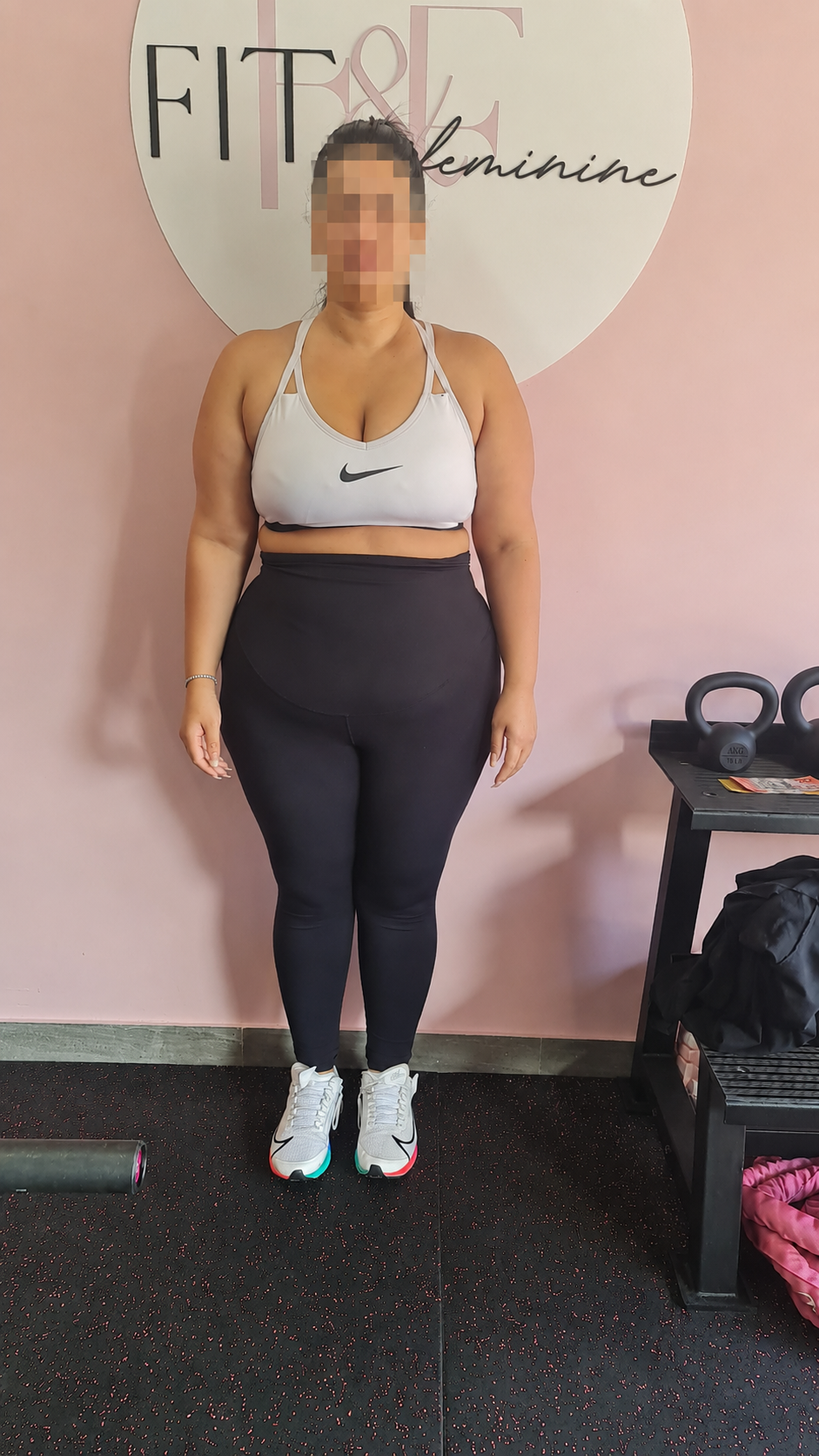 Before photo of a Fit & Feminine coaching client with her face blurred for privacy